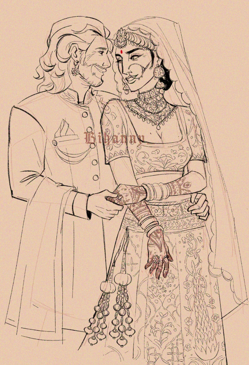 A couple getting married in South Asian Indian wedding attire